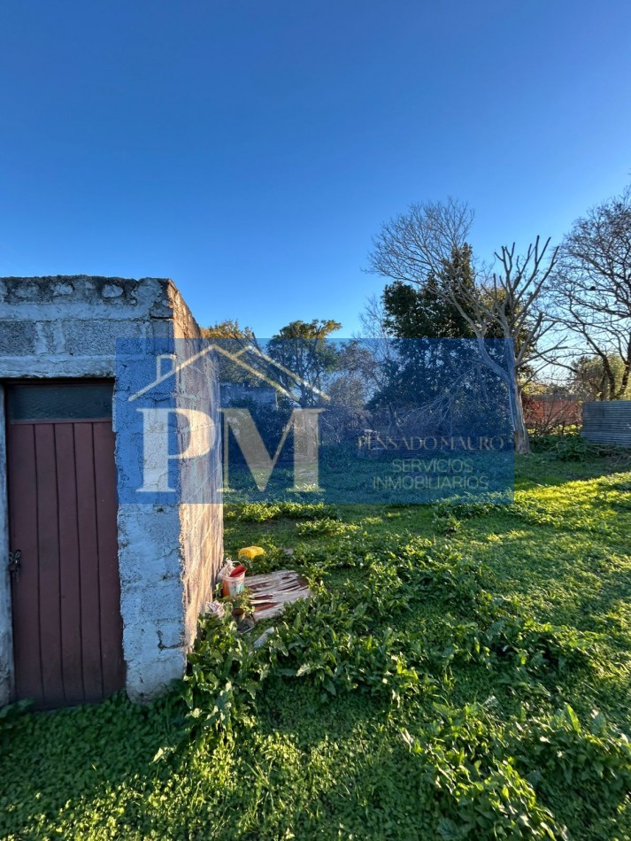 CASA CON AMPLIO TERRENO EN VENTA