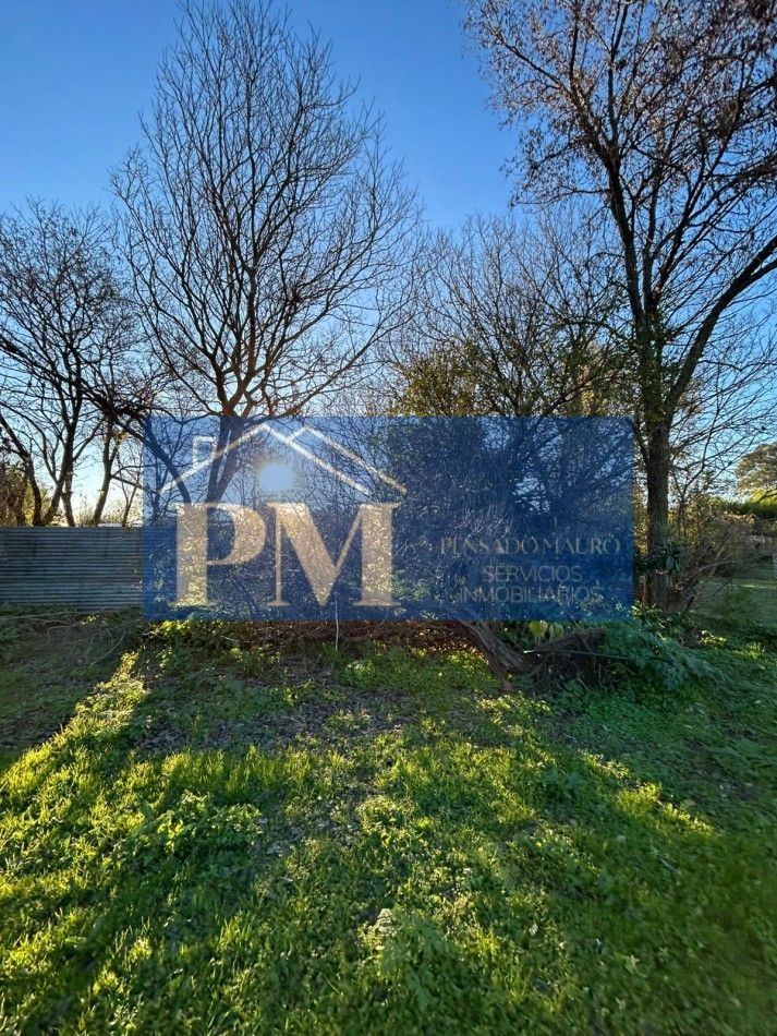 CASA CON AMPLIO TERRENO EN VENTA
