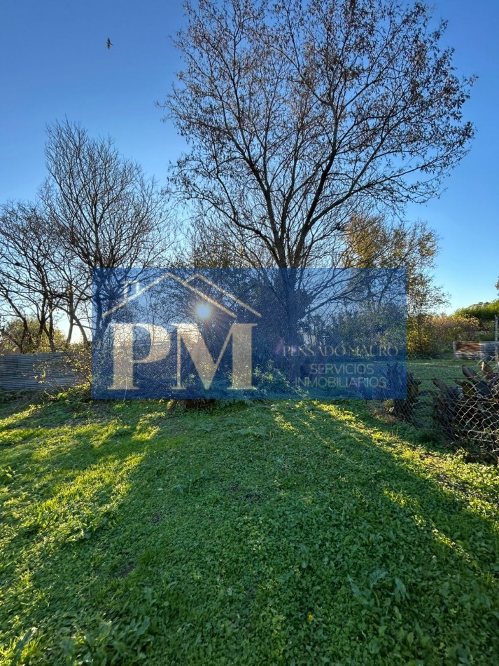 CASA CON AMPLIO TERRENO EN VENTA
