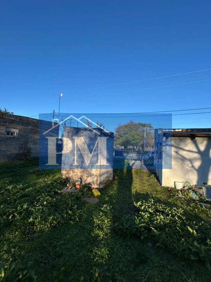 CASA CON AMPLIO TERRENO EN VENTA