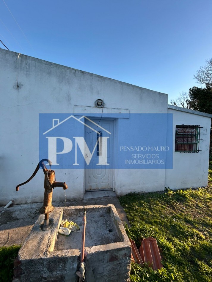CASA CON AMPLIO TERRENO EN VENTA
