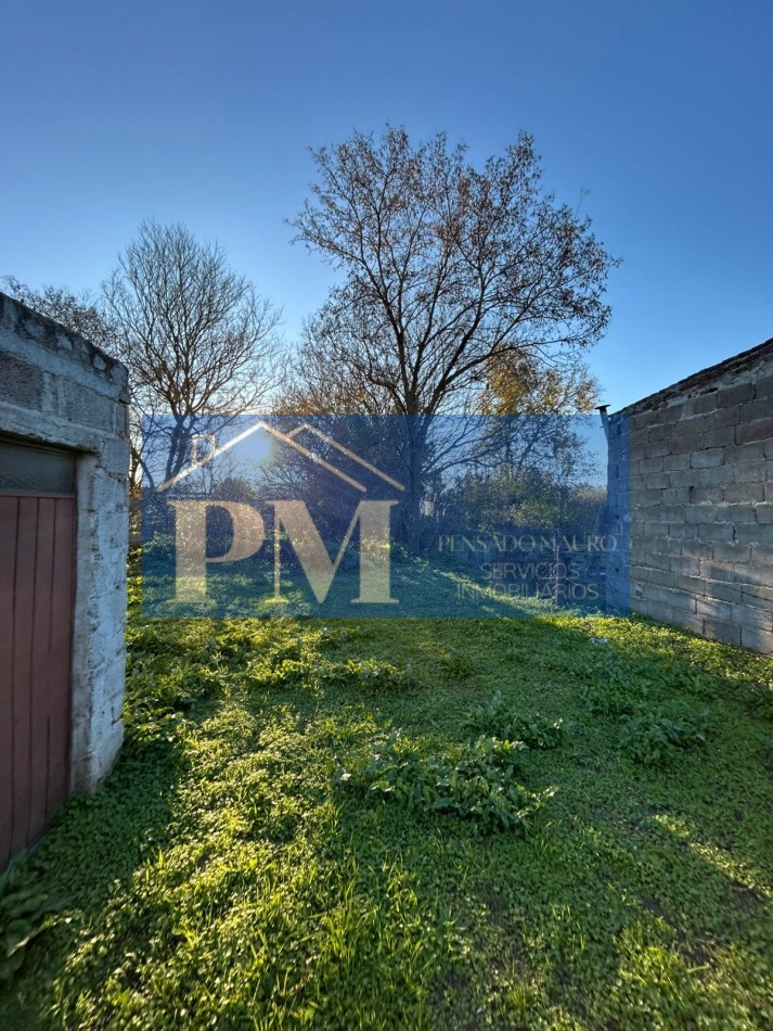 CASA CON AMPLIO TERRENO EN VENTA