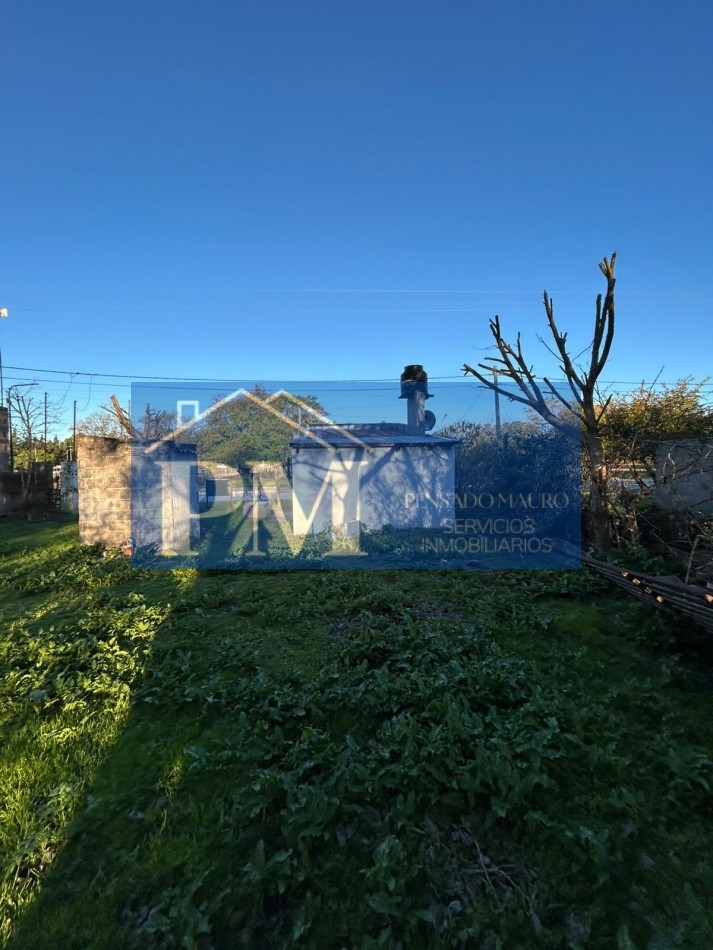 CASA CON AMPLIO TERRENO EN VENTA