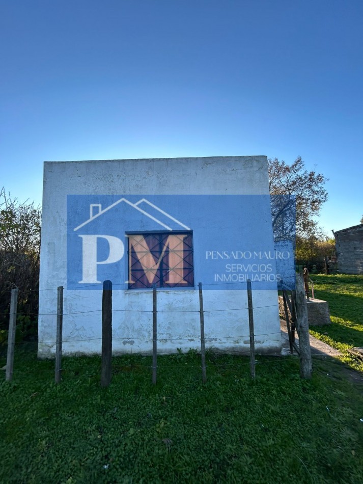 CASA CON AMPLIO TERRENO EN VENTA