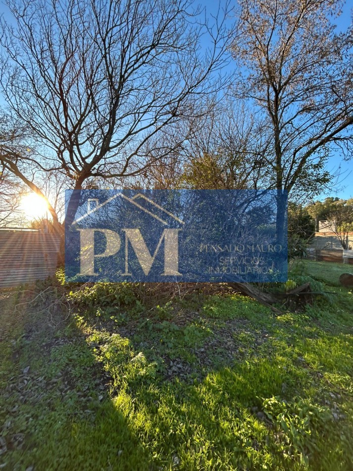 CASA CON AMPLIO TERRENO EN VENTA