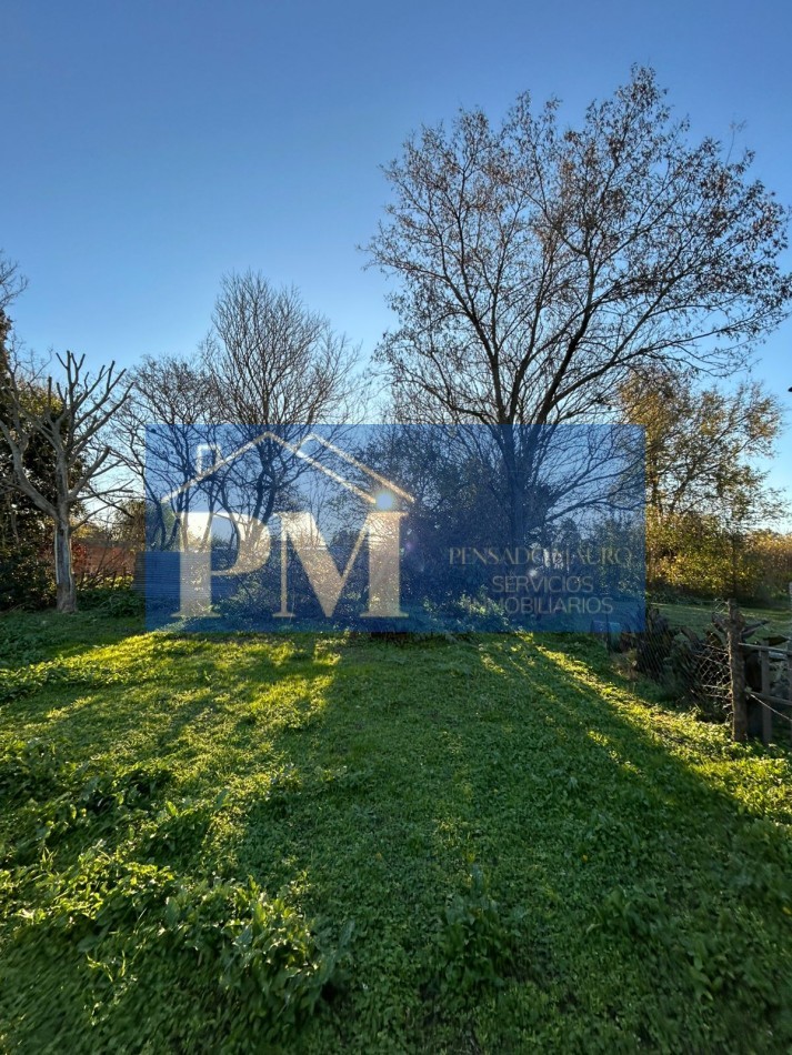 CASA CON AMPLIO TERRENO EN VENTA
