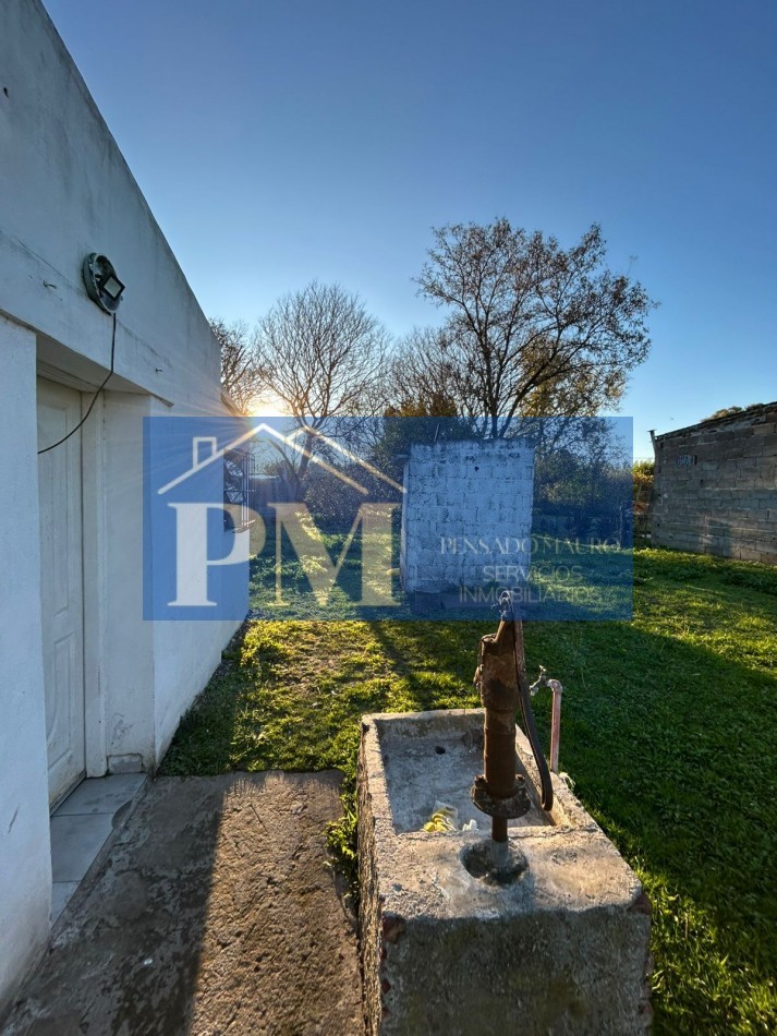 CASA CON AMPLIO TERRENO EN VENTA
